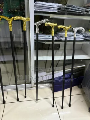 Stylish Pimped Walking Sticks 
With Sword 
Golden/Silver Handless
