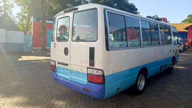Toyota Coaster 2016 White - thumbnail 3