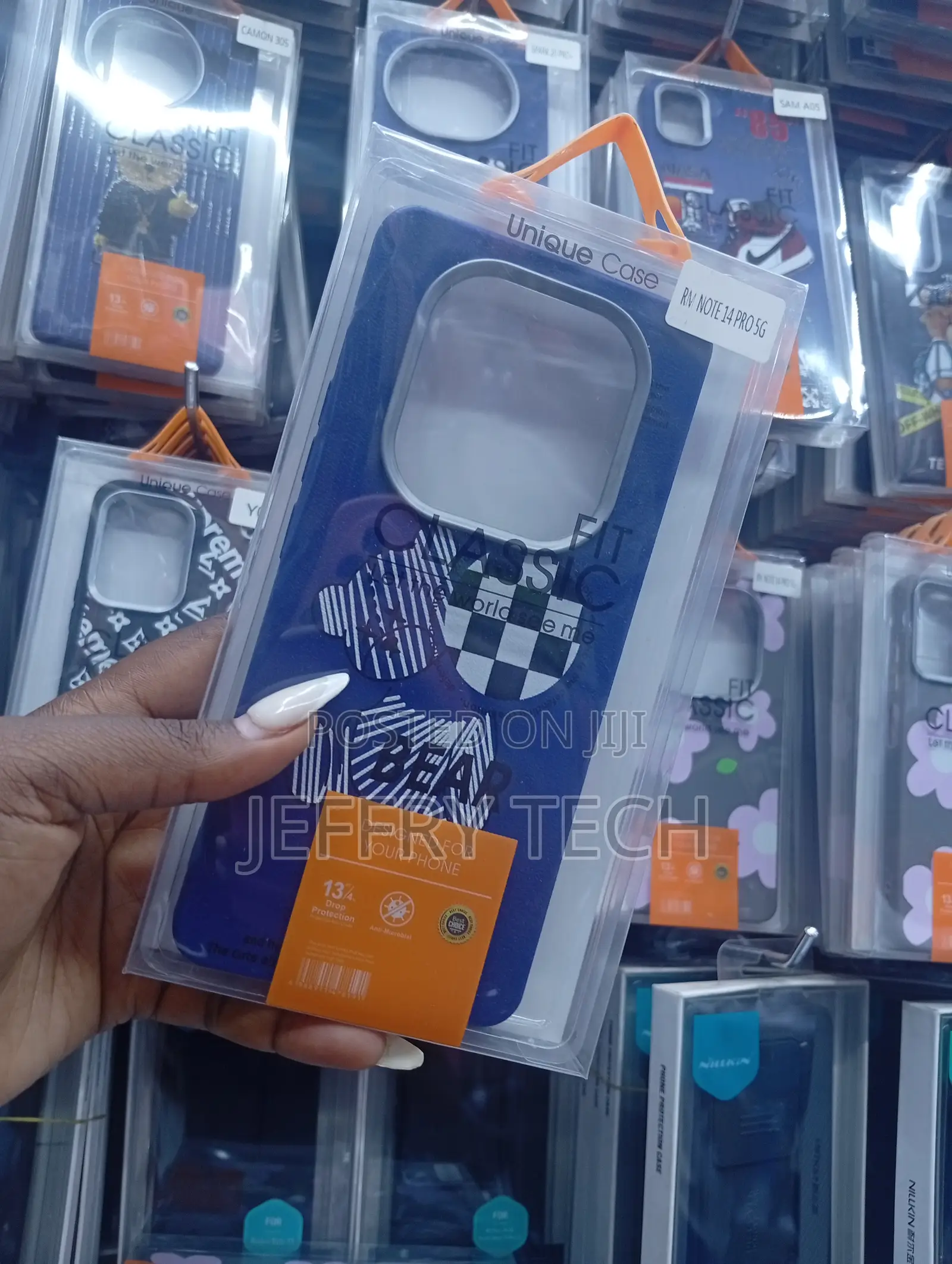 Rv Note 14 Pro Case a Checkered "Bear" Motif With "Classic" Branding.