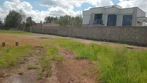Prime 50x100 Plot in Mugutha Near Bustani Bistro – 3.5m – Ready Title