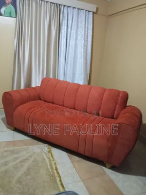 3-Seater Orange Sofa-Clean and Comfy