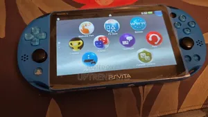 Blue Playstation Vita Chipped With 10 Plus Games