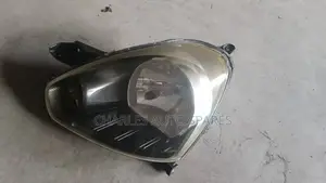 Daihatsu Mira Eis Headlight