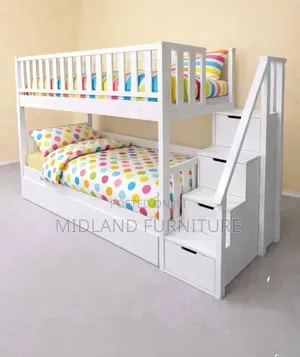 A Double Decker Beds With Stairs Storage Cupboard