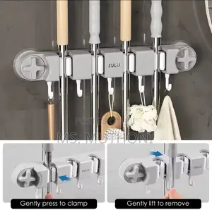 Organizer Designed for Mops, Brooms, and Other Cleaning Accessories.