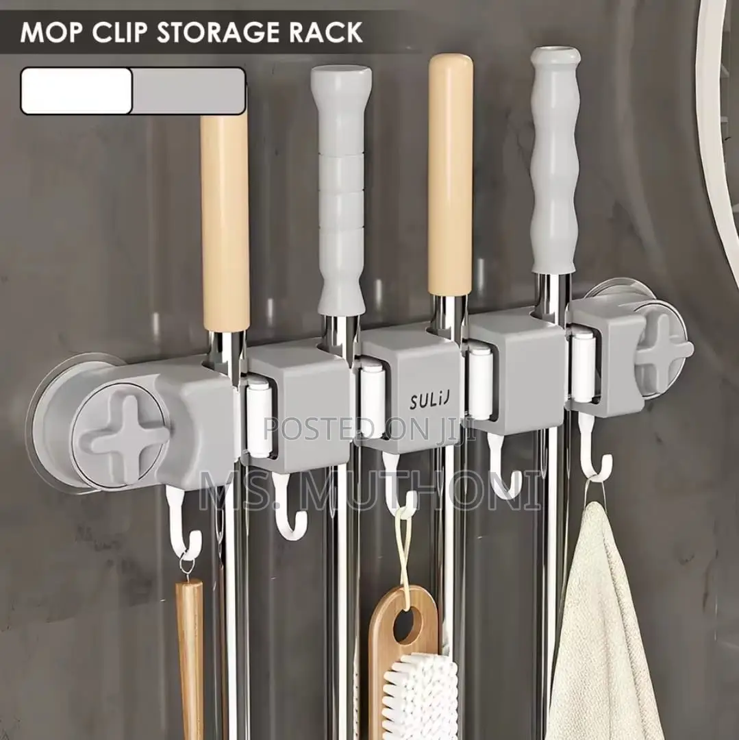 Organizer Designed for Mops, Brooms, and Other Cleaning Accessories.