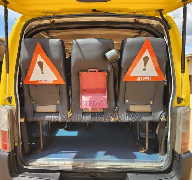 Nissan Caravan (Urvan) 2013 Yellow - thumbnail 8