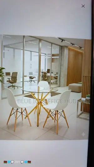 Transparent Glass Table With Eames Chairs White