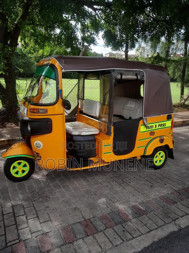 Bajaj RE 2023 Yellow - thumbnail 4