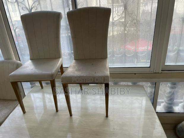 Cream Gold Marble Dining Table With Cream Velvet Dining Chairs