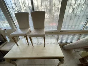 Cream Gold Marble Dining Table With Cream Velvet Dining Chairs