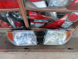 Pajero Io Headlight Complete With Bulb and Socket