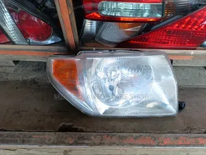 Pajero Io Headlight Right Side Complete With Bulb and Socket