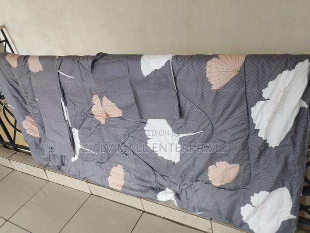 Unbinded Cotton Duvet 5*6 With Free 2 Pillow Cases and 1 Bedsheet