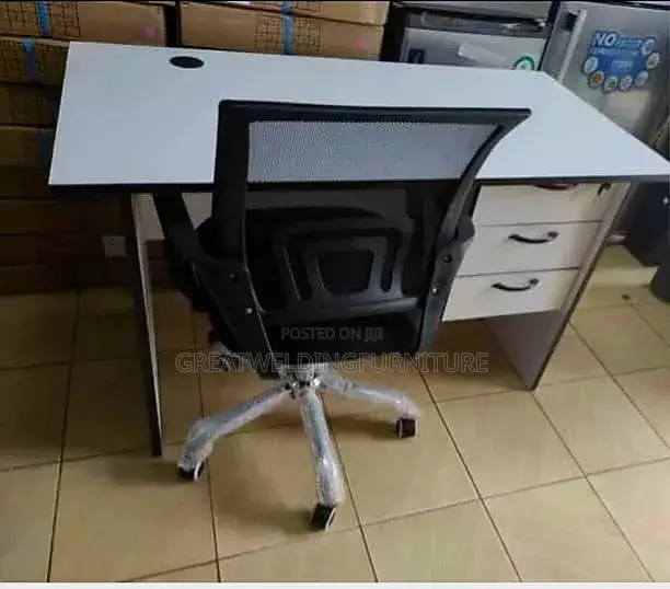 1.2m Office Desk Paired With a Breathable Black Mesh Office Chair PJN