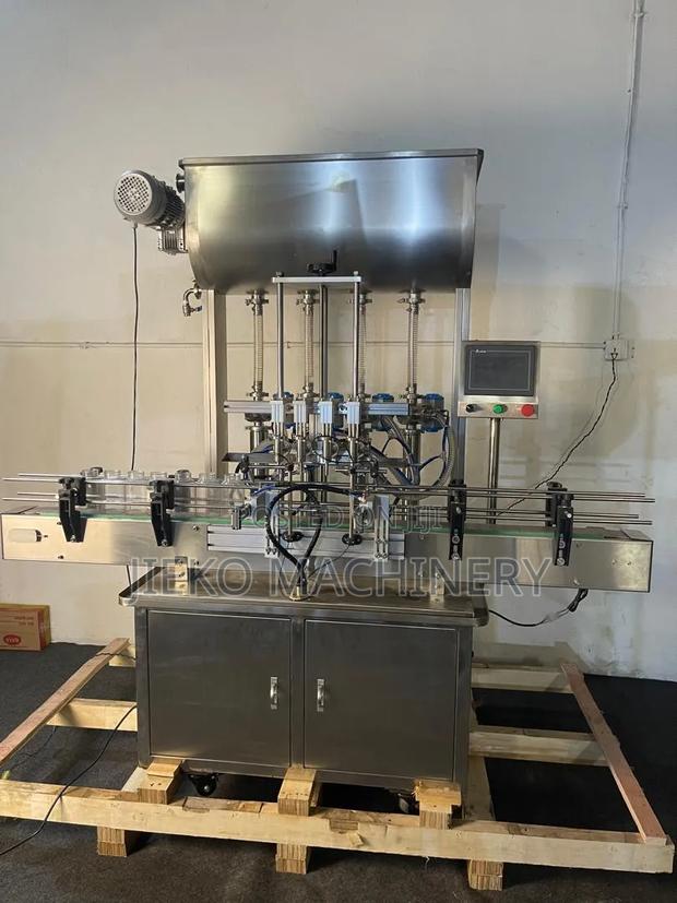 4 Nozzle Liquid Filling Machine | Automatic Bottle Filling Equipment