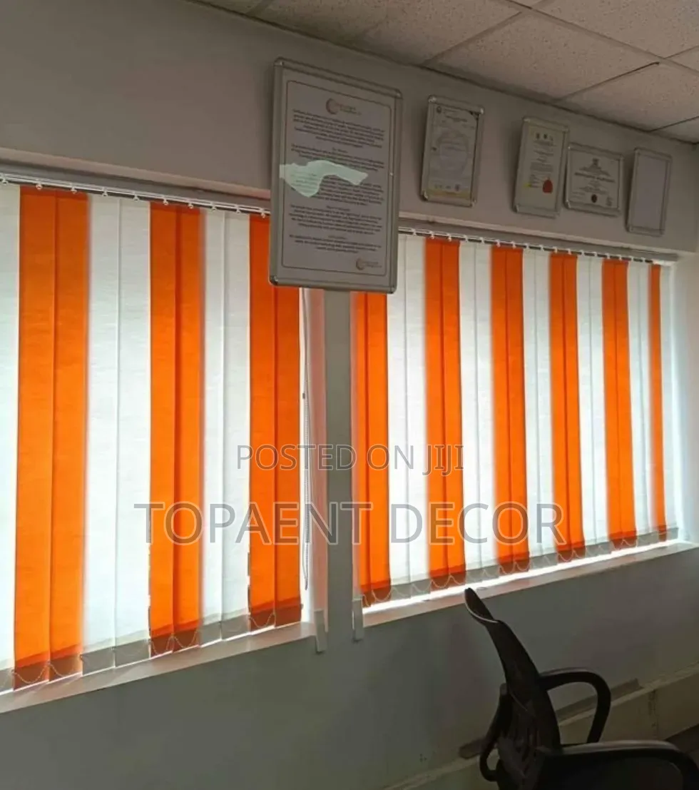 Vertical Perfection With Orange and White Blinds