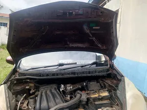 Nissan Note 2012 Maroon