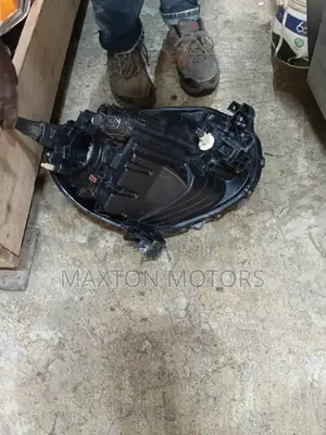 Headlight Nissan March 2010