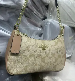 Beige Ladies Leather Coach Bags With Adjustable Shoulder Strap