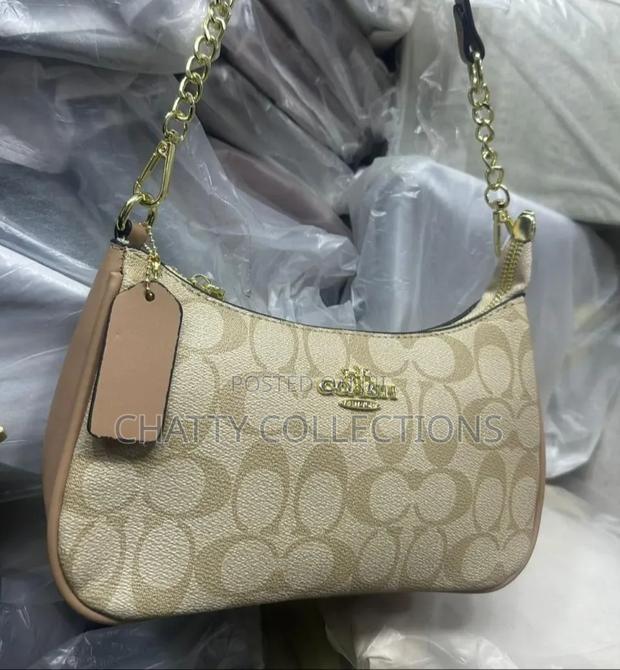 Beige Ladies Leather Coach Bags With Adjustable Shoulder Strap