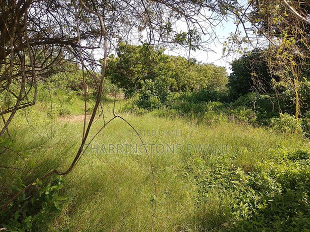 1 Acre Plot| 5th Row Diani | Flat| Perimeter Fence | All-Weather Road