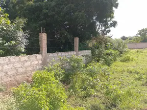 1 Acre Plot| 5th Row Diani | Flat| Perimeter Fence | All-Weather Road