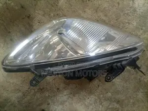 Headlight Mitsubishi Cedia 2004