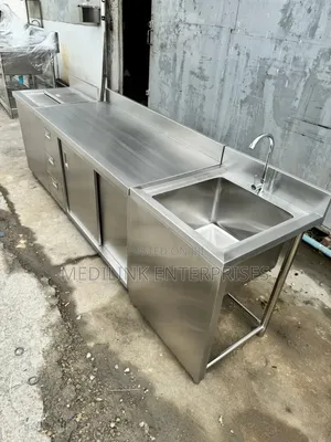 Combined Stainless Steel Cabinet With a Sink Area