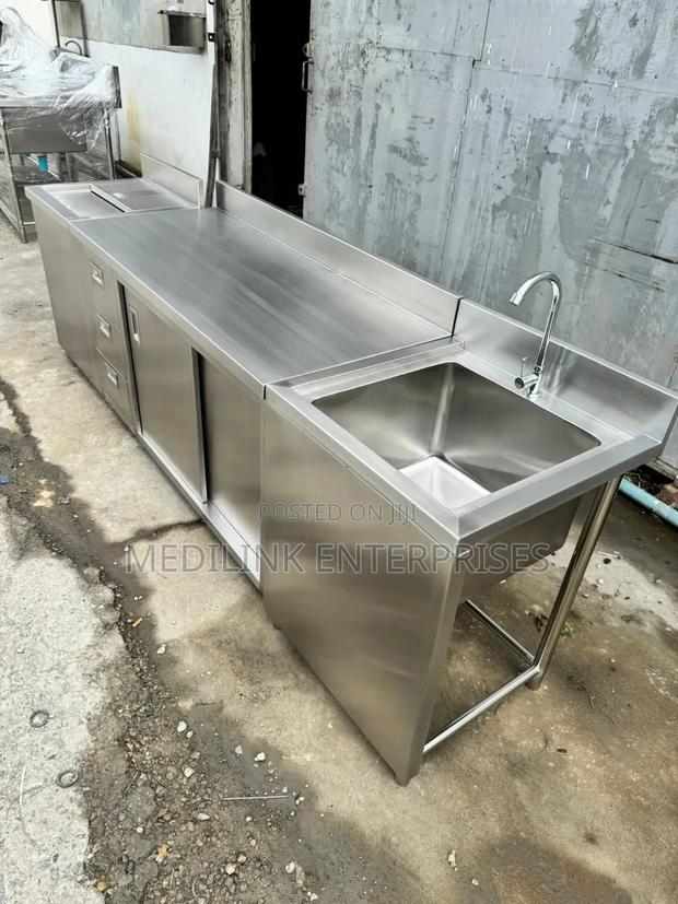 Combined Stainless Steel Cabinet With a Sink Area