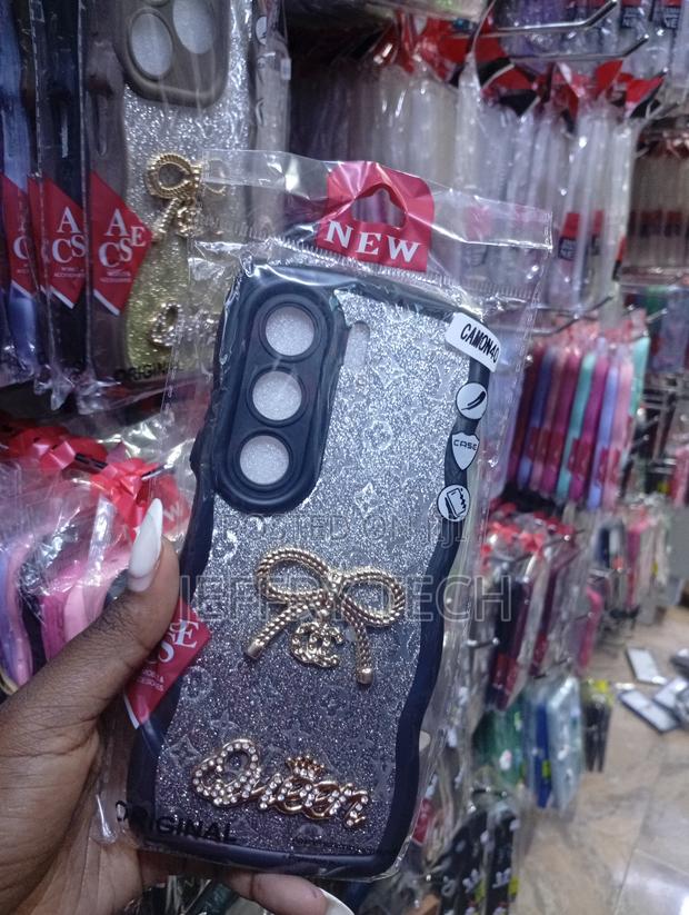 Tecno Camon 40, Silver Glitter Finish, a Bow Emblem Case. - thumbnail 2