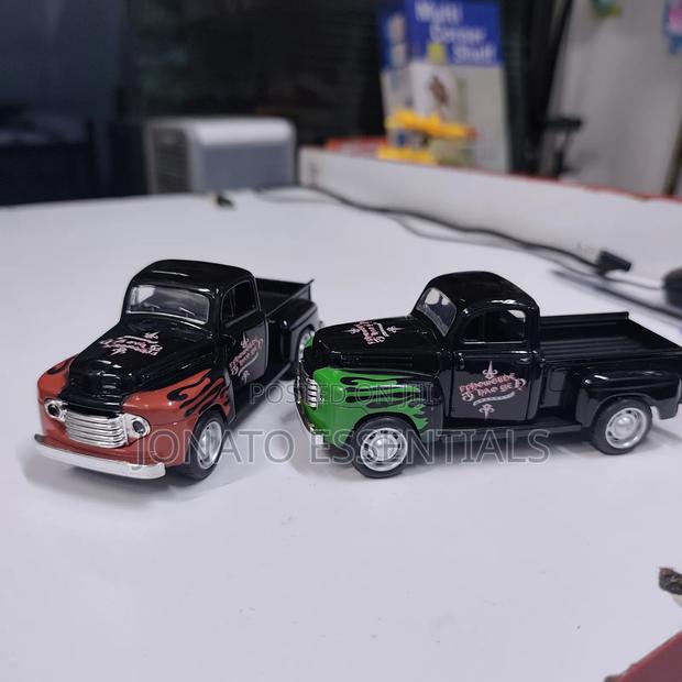 Vintage Die-Cast Pickup Truck Toy With Flame Graphics