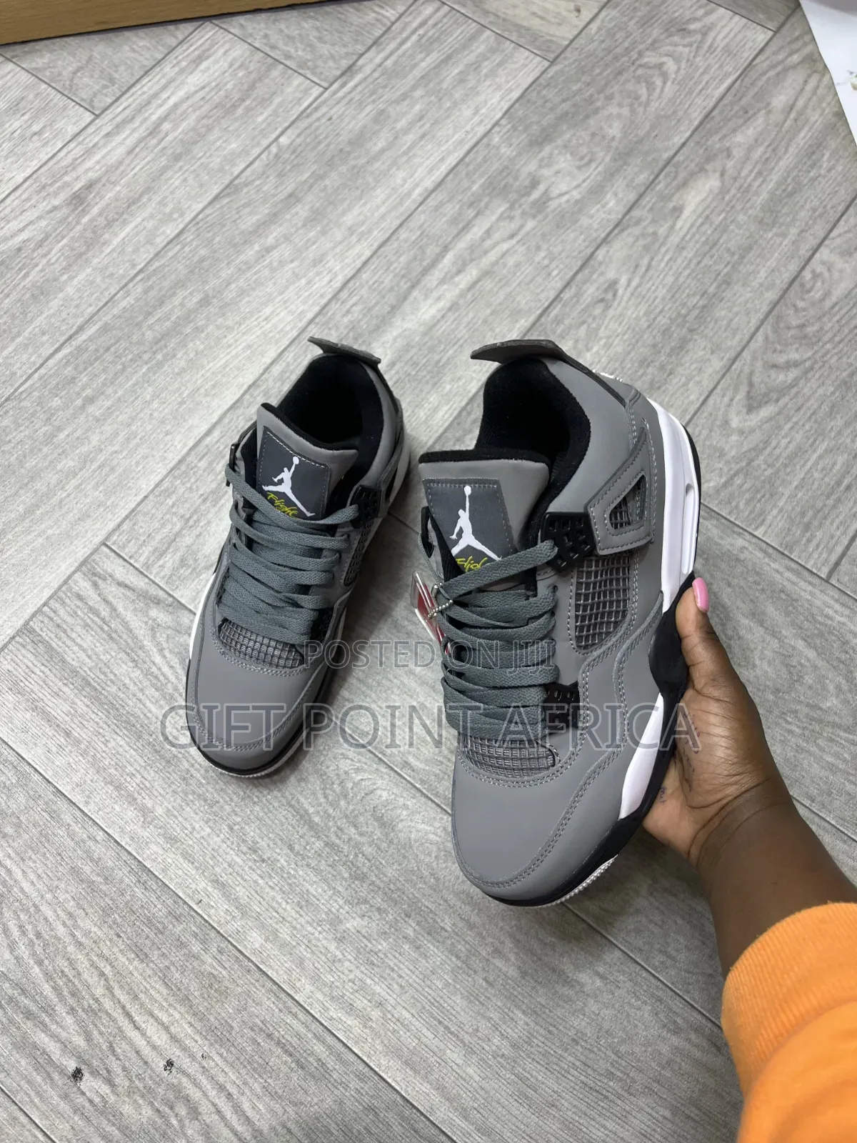 Nike Air Jordan 4 Retro 'Cool Grey' Sneakers.