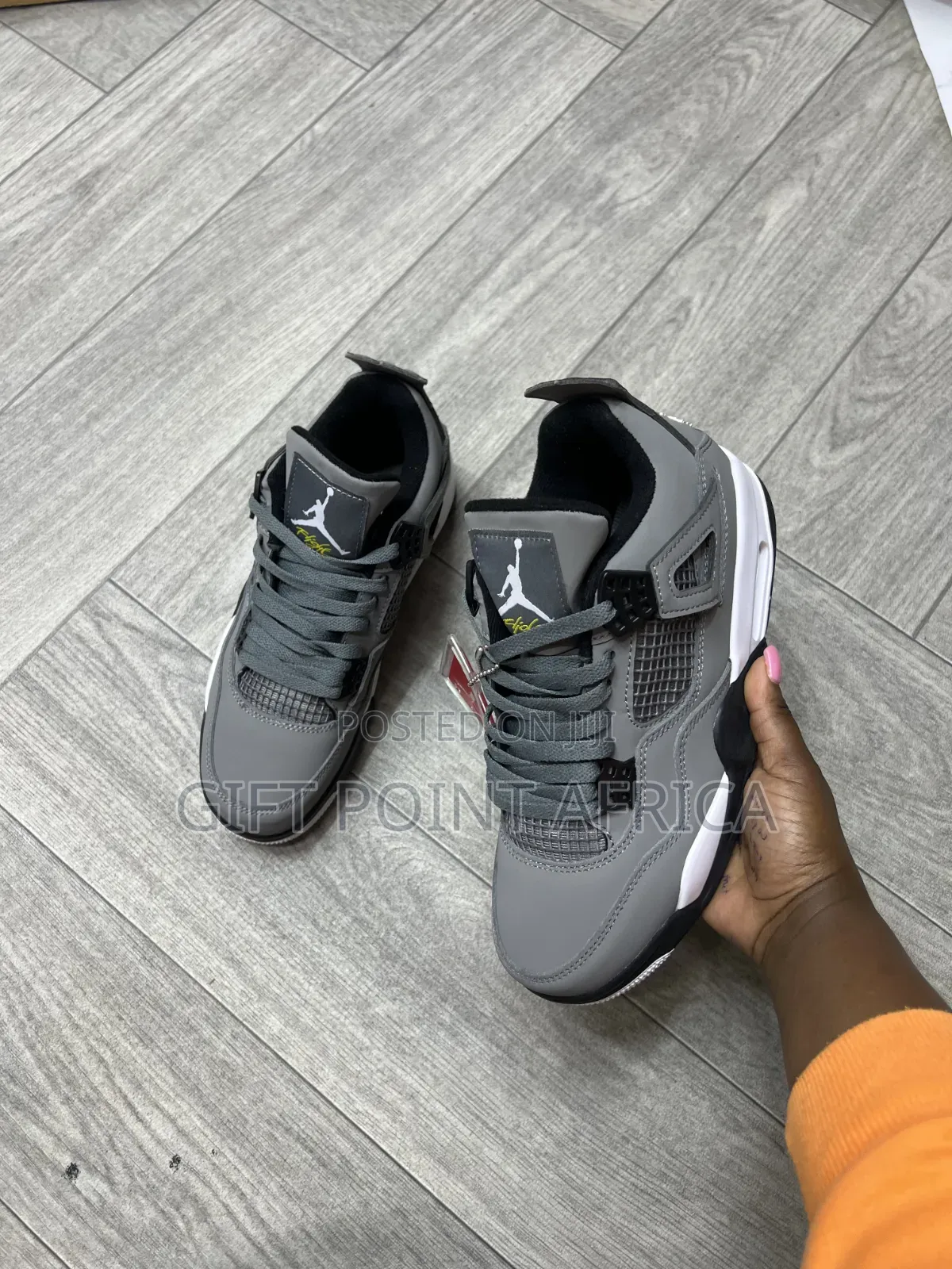 Nike Air Jordan 4 Retro 'Cool Grey' Sneakers.