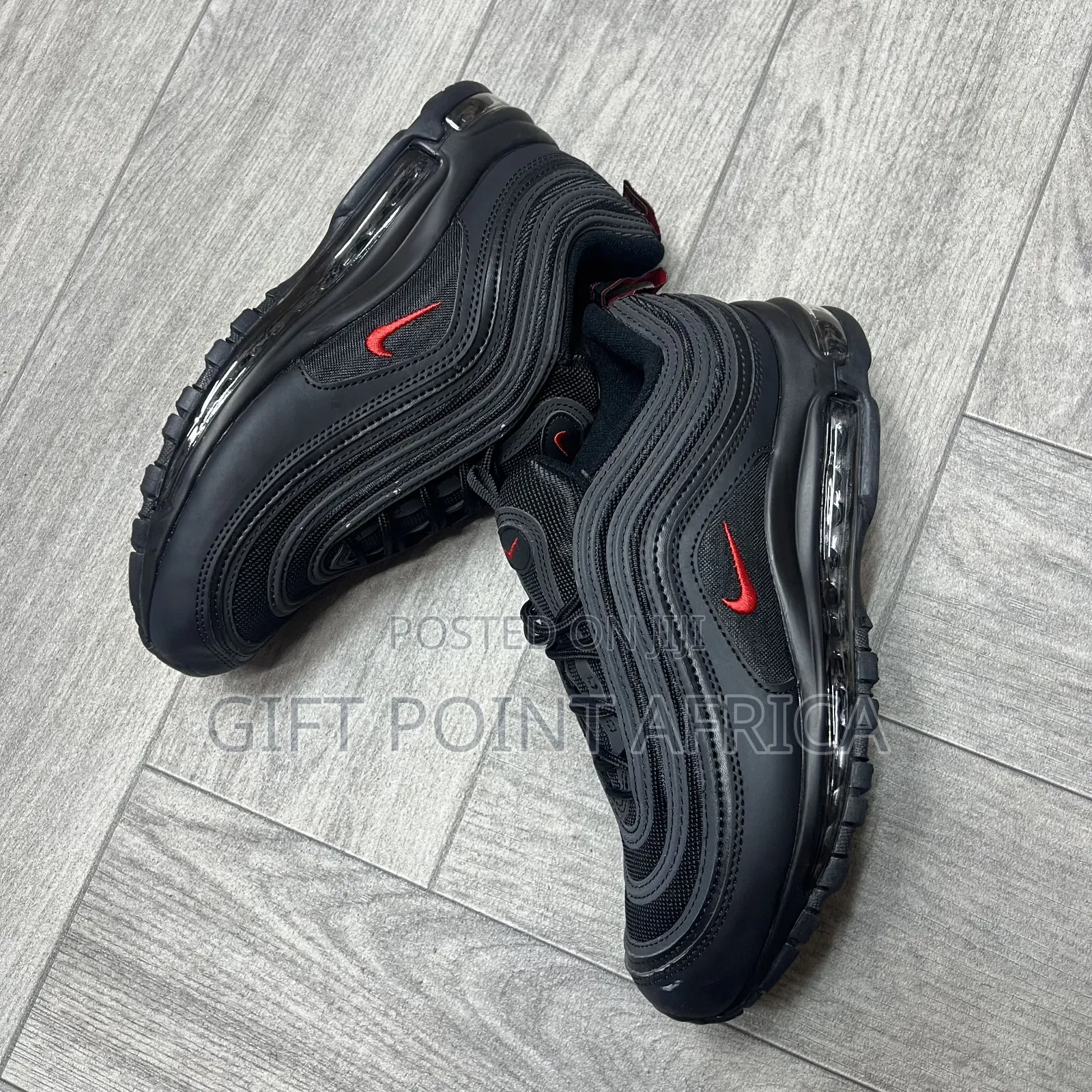 Nike Air Max 97 Sneakers in a Black and University Red