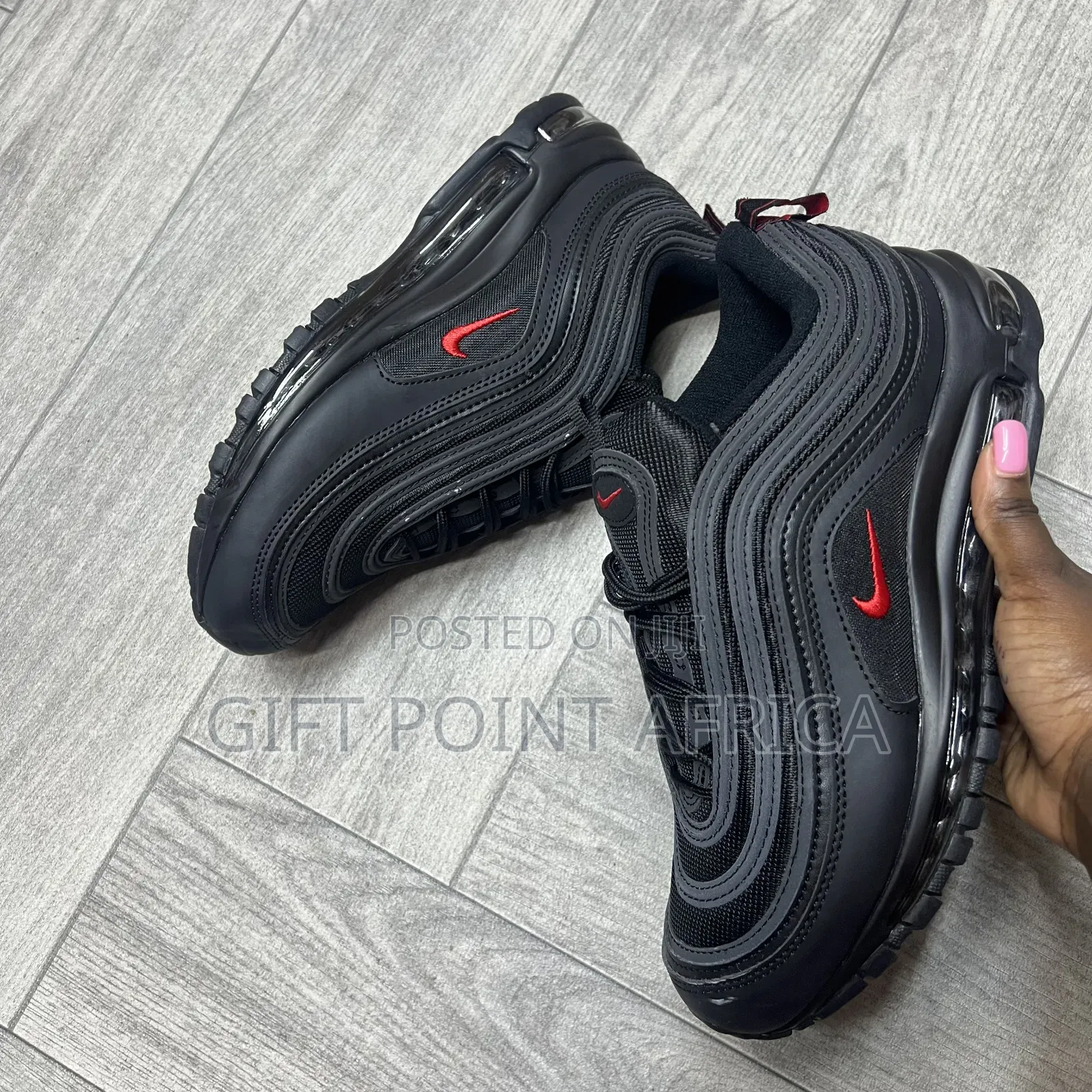 Nike Air Max 97 Sneakers in a Black and University Red