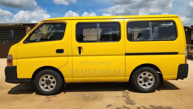 Nissan Caravan (Urvan) 2011 Yellow - thumbnail 5