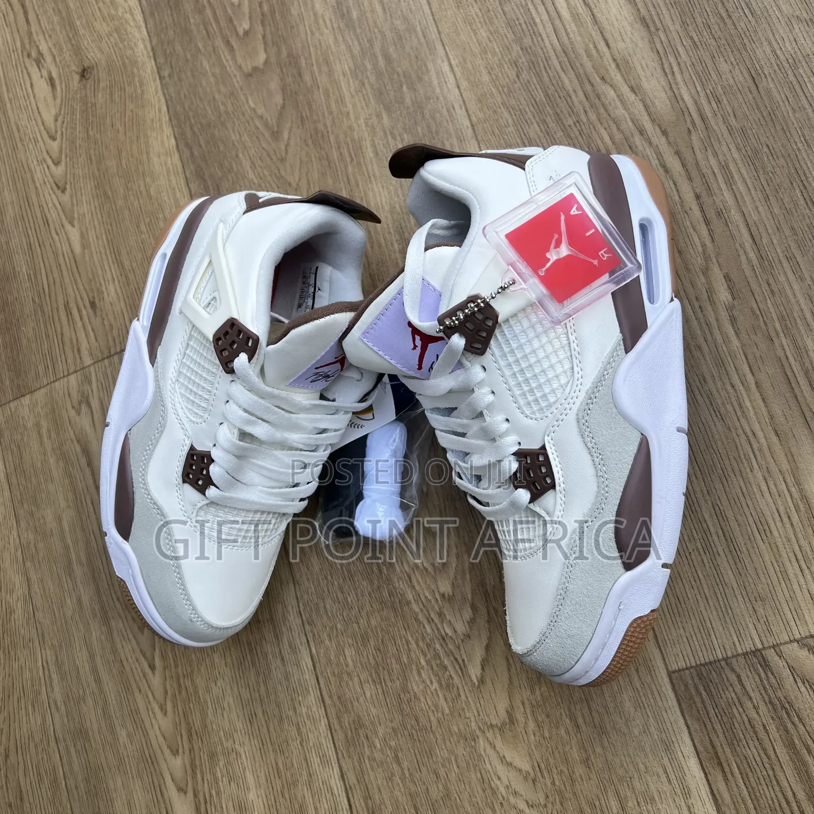 Nike Air Jordan 4 "Mocha" Sneakers.