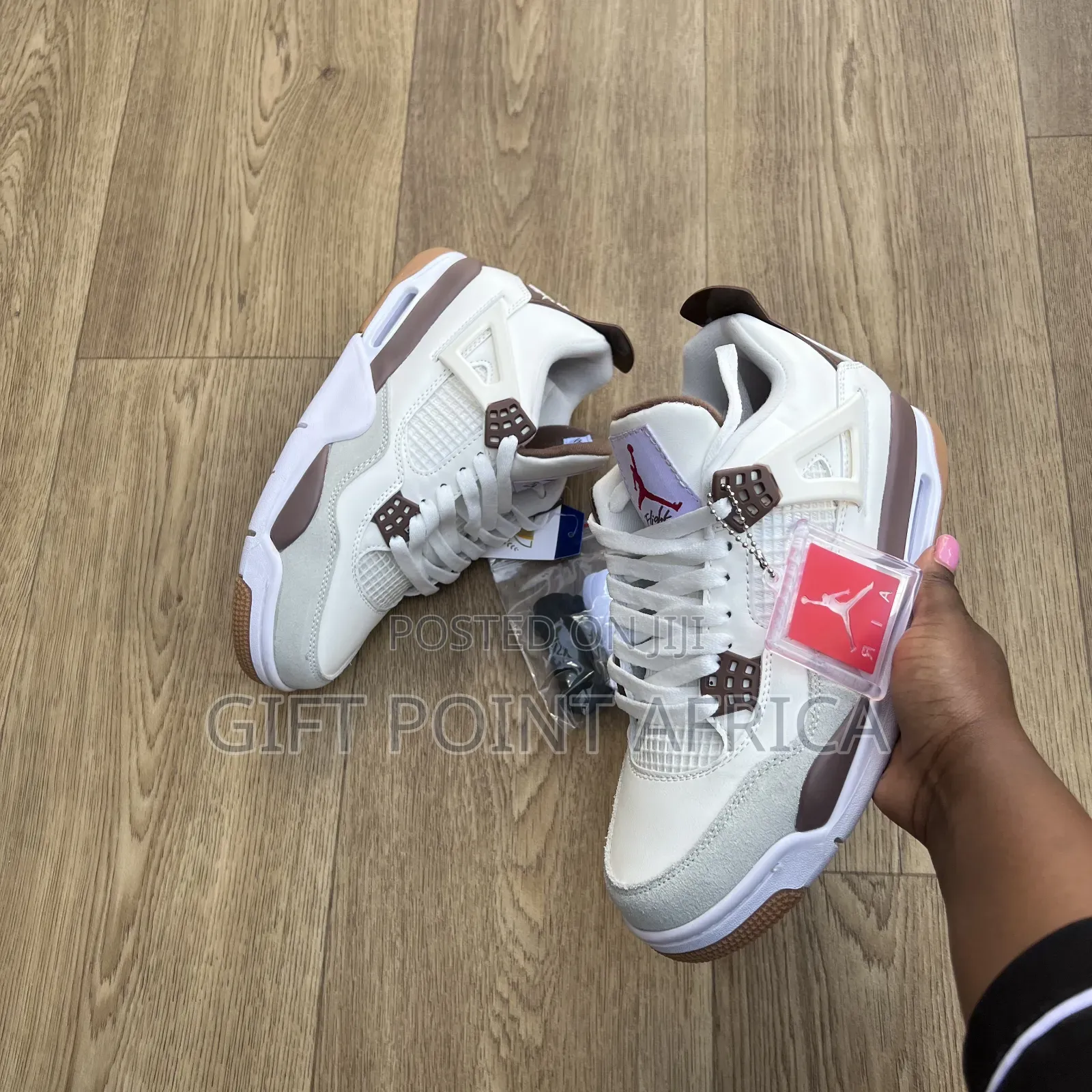 Nike Air Jordan 4 "Mocha" Sneakers.