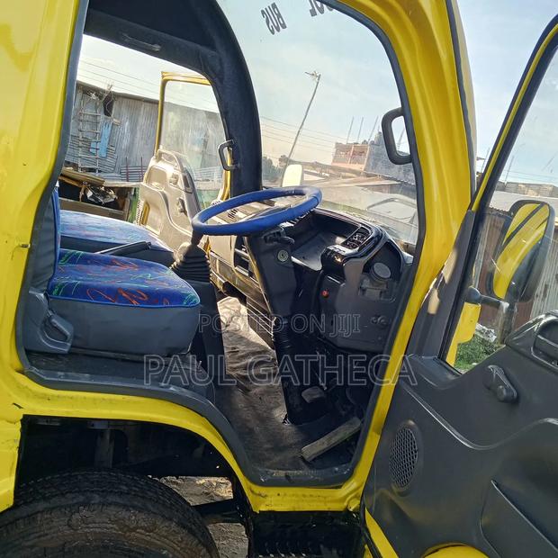 Isuzu NQR 2019 Yellow - thumbnail 2