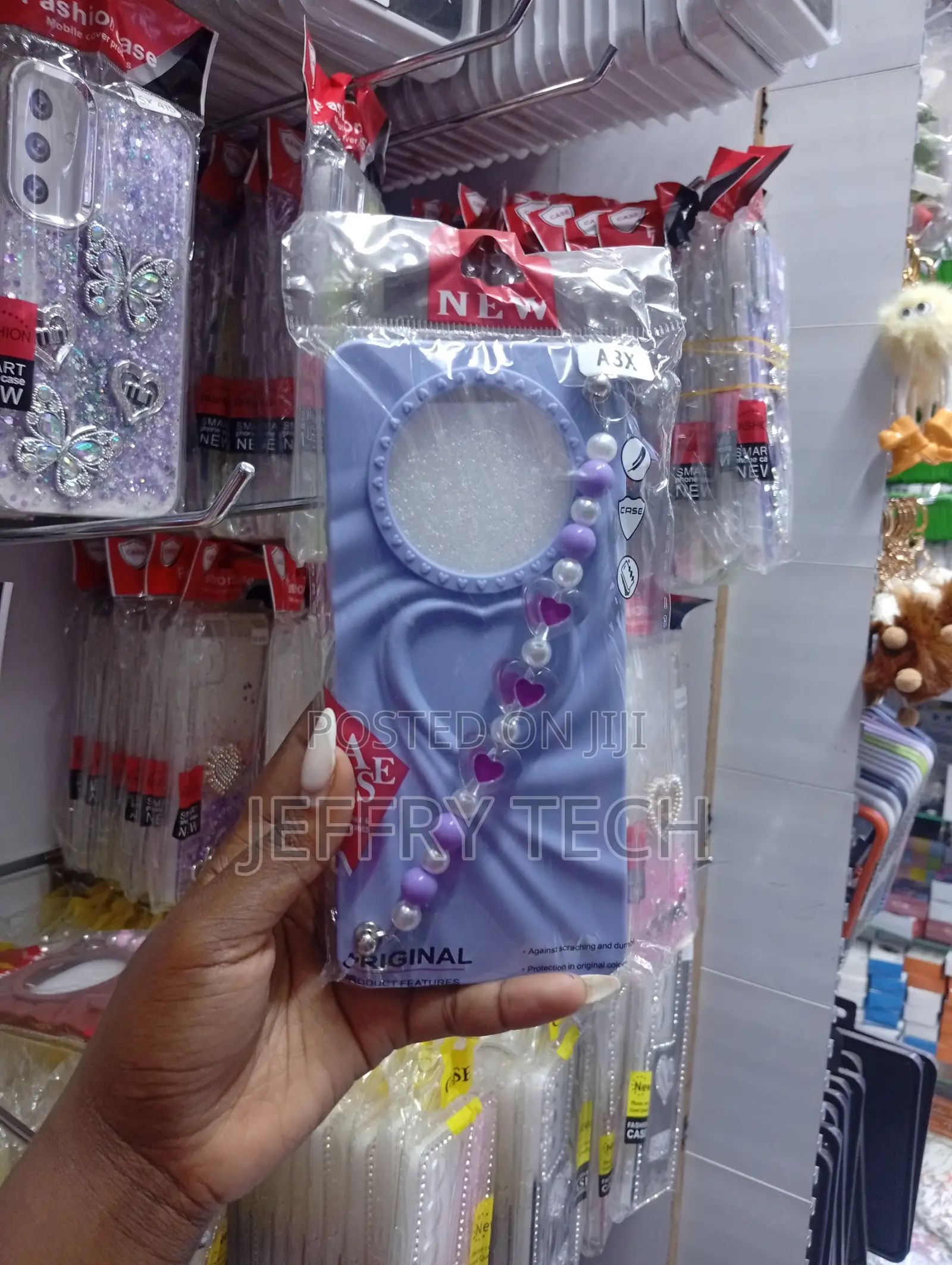 Oppo A3x Wavy Border and a Matching Beaded Heart Charm Strap Case