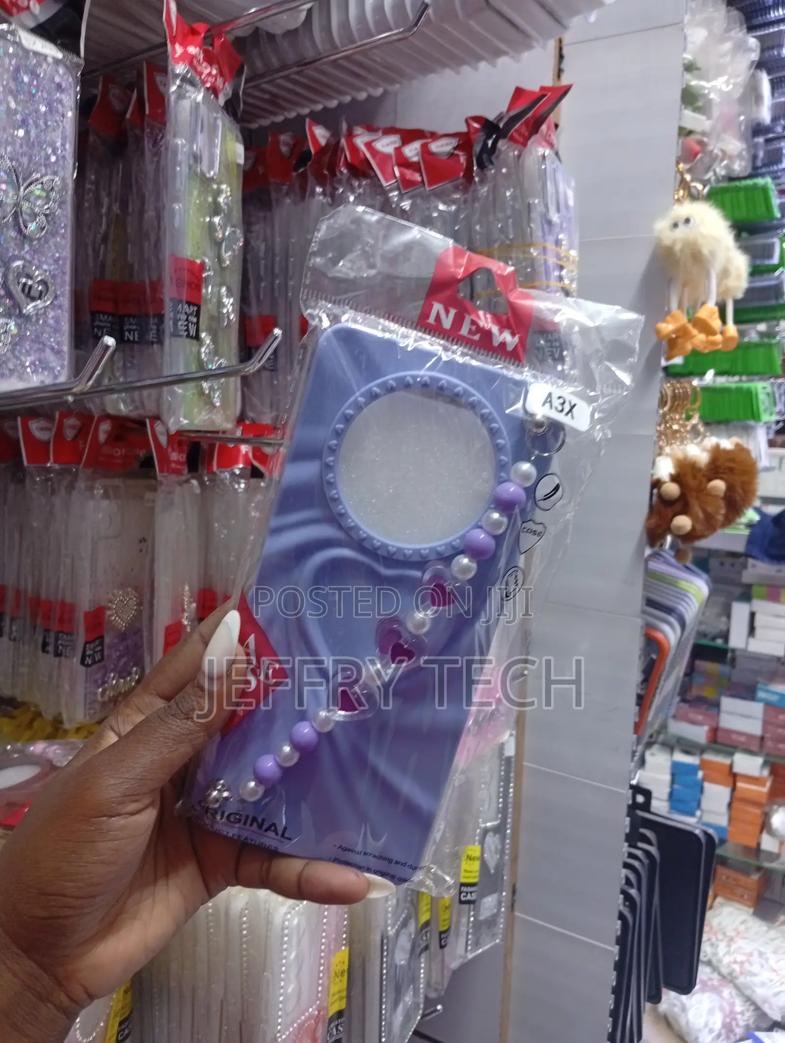 Oppo A3x Wavy Border and a Matching Beaded Heart Charm Strap Case