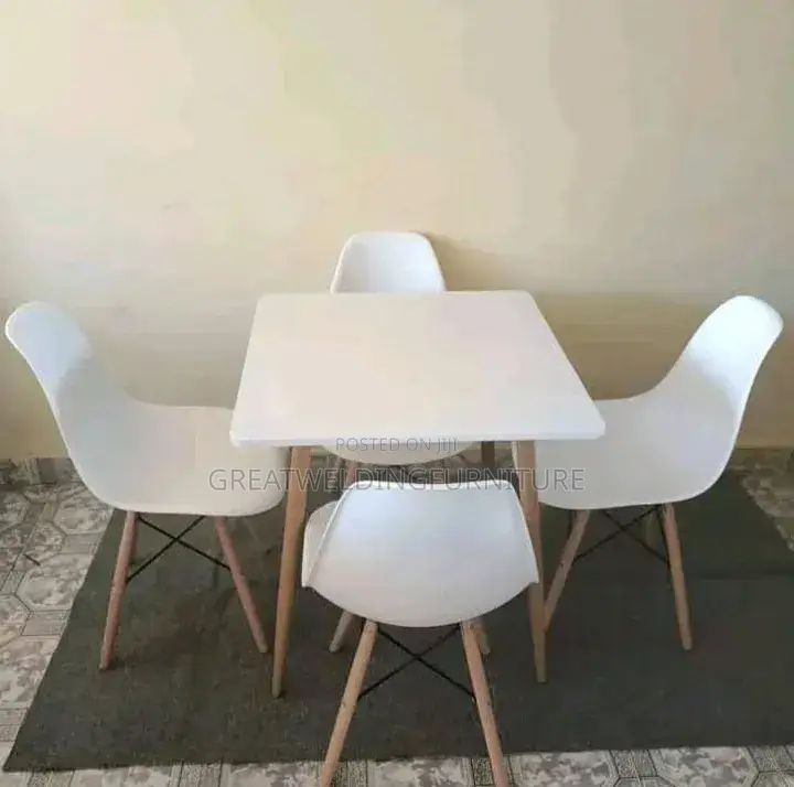 White Table and Eames Office Chair