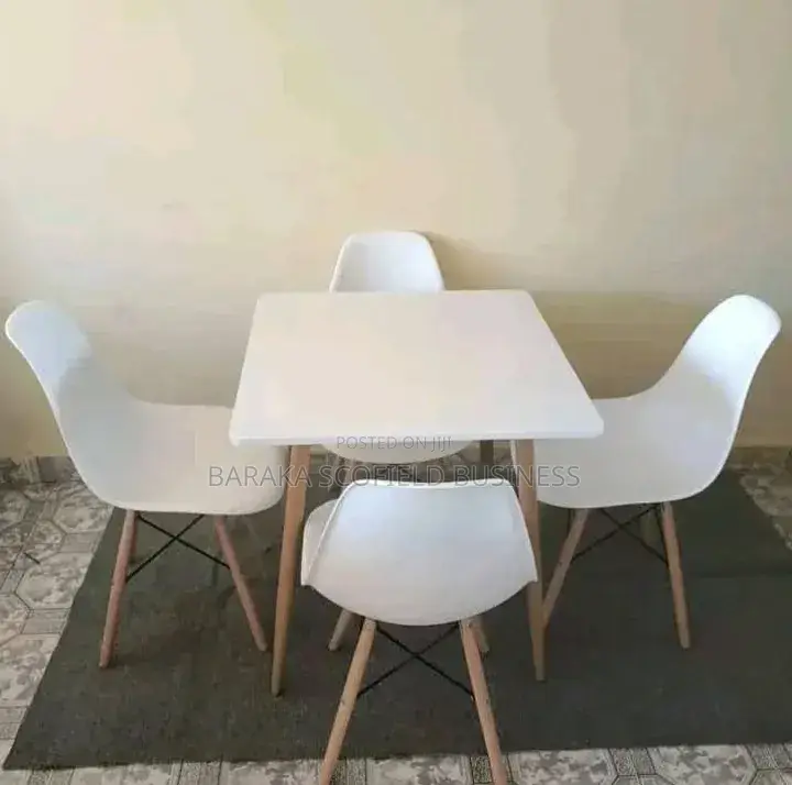 White Table and Eames Office Chair