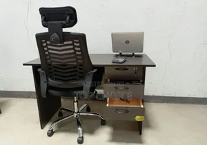 Gray Table and Headrest Chair