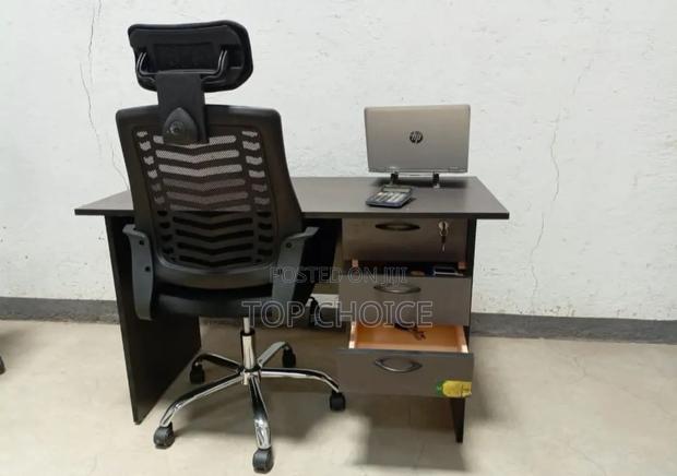 Gray Table and Headrest Chair