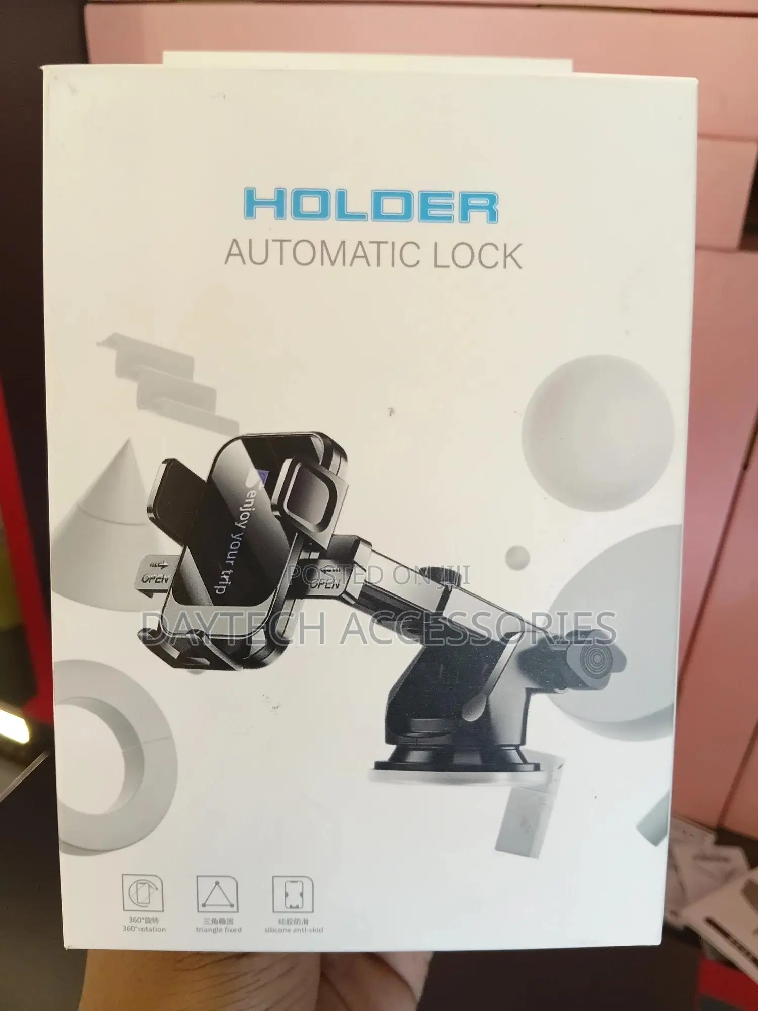 Car Phone Holder With a Telescopic Arm and Automatic Lock Mechanism