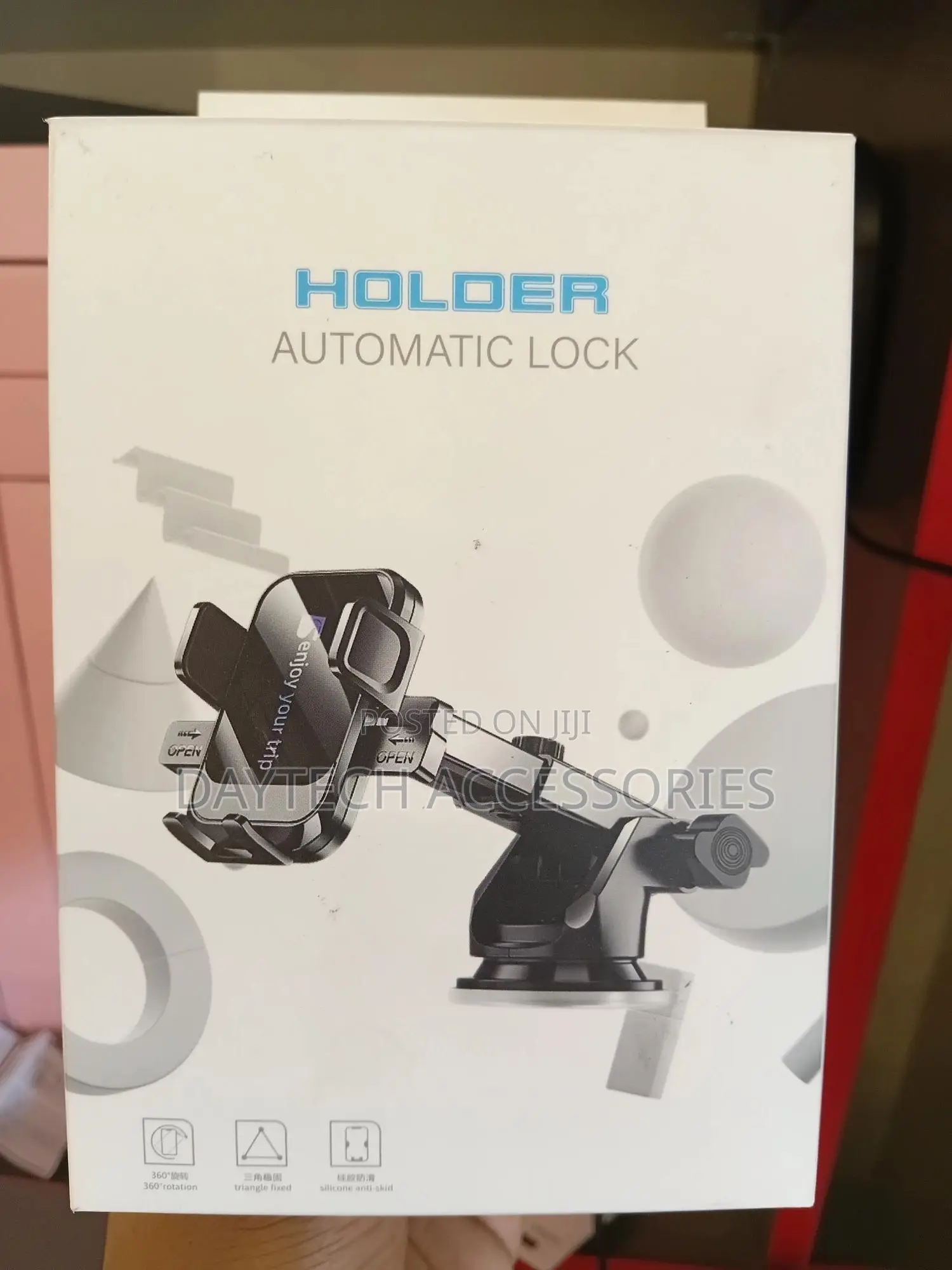 Car Phone Holder With a Telescopic Arm and Automatic Lock Mechanism
