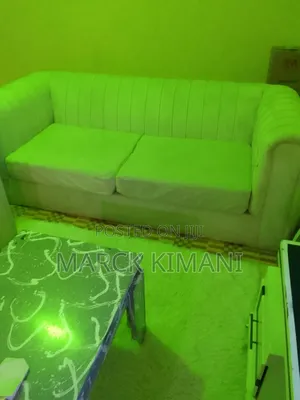 White Sofa 5 Sitter White in Color in Good Condision