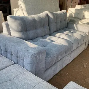 Quality Three-Seater Sofa With Tufted Cushions